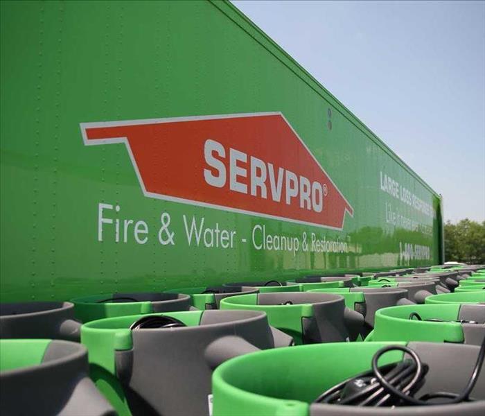 green SERVPRO sign with air dryers 
